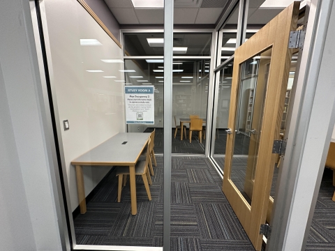 Small study room with one table and two chairs.